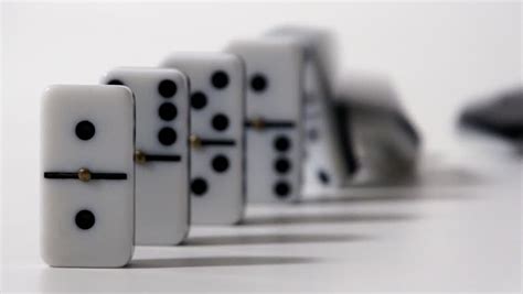 Black Dominoes Falling In Chain Reaction Stock Footage Video 9334763 | Shutterstock