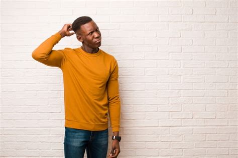 Premium Photo Young African American Black Man Feeling Puzzled And