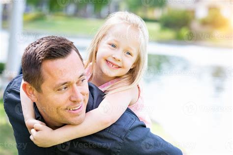 Young Caucasian Father And Daughter Having Fun At The Park 16376769