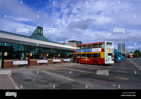 buses and passengers at Leeds city bus station Yorkshire UK Stock Photo - Alamy