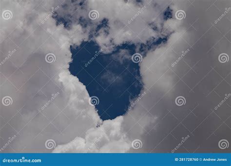 High Altitude Cumulonimbus Clouds With Clear Blue Sky Background Stock