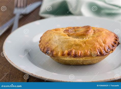 Steak Meat Pie With Gravy Beef Pie In Puff Pastry Close Up On Stock