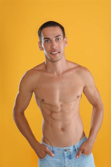 Shirtless Man With Slim Body And Measuring Tape Isolated On White