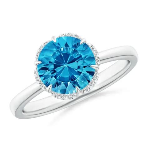 Buy Angara Round Swiss Blue Topaz Engagement Ring With Floral Halo