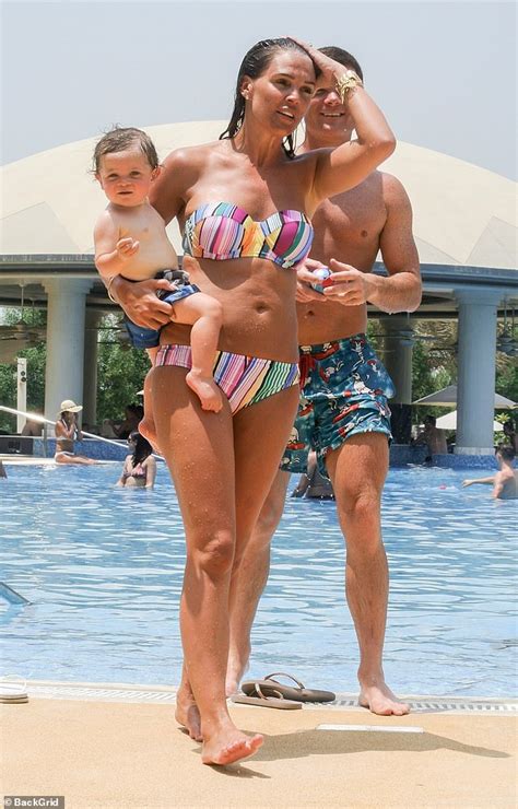 Danielle Lloyd Displays Her Slender Frame In Strapless Striped Bikini