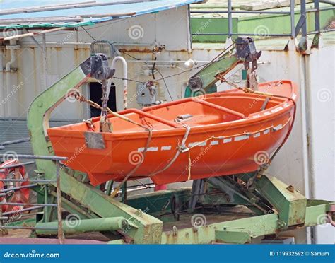 Orange Lifeboat On Ship Stock Photo Image Of Davit 119932692