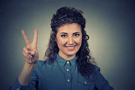 Portrait Lovely Happy Teenage Girl Showing Victory Or Peace Sign Stock