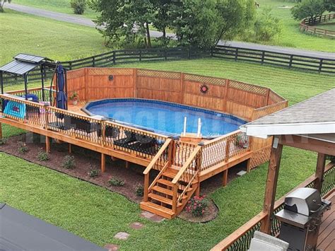 An Above Ground Pool Surrounded By Wooden Decks