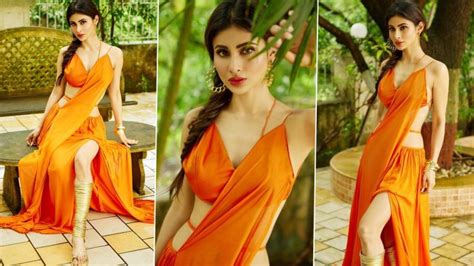 Mouni Roy Flaunts Her Curves In A Sultry Orange Cut Out Dress Calls