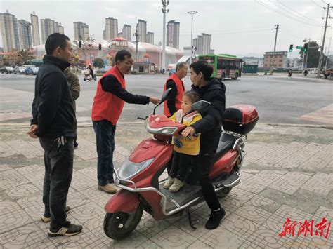 龙山县华塘街道：一抹红色“风景线” 点燃冬日“温暖情” 湘西 新湖南