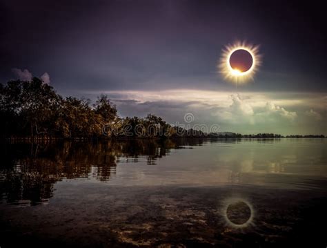 Natural Phenomenon Solar Eclipse Space With Cloud On Gold Sky B Stock