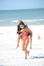 Lisa Opie Hot In Orange Bikini With A Friend On The Beach In Miami