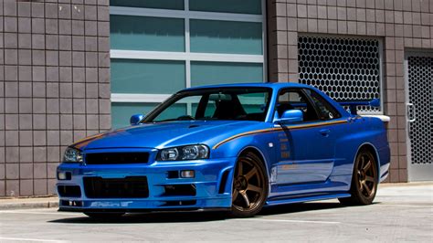 PHOTOS - 580 000 euros pour une Nissan Skyline GT-R conduite par Paul ...