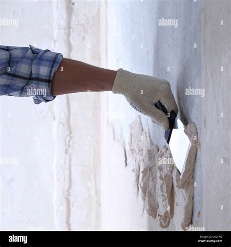 Work Aligns With A Spatula Wall Stock Photo Alamy