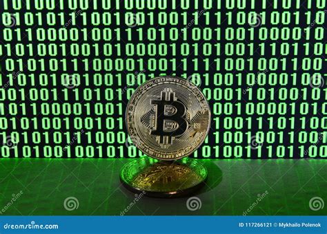 A Pair Of Bitcoins Lies On A Cardboard Surface On The Background Of A