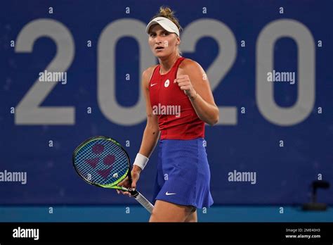 Marketa Vondrousova, of the Czech Republic, reacts after winning a ...