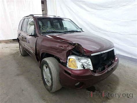 Report 1gkdt13s532140134 Gmc Envoy 2003 Red Gas Price And Damage History