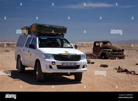 Toyota Hilux Camper And Derelict Truck Near Fish River Canyon Southern