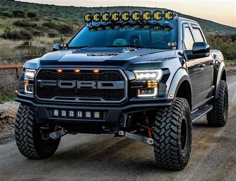 Lifted Ford Raptor With Kc Off Road Lightbar Find Out More About This Rig Look Up Specs And