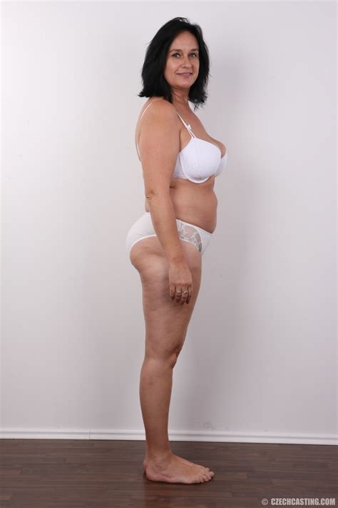 Mature Chick Slowly Gets Naked As She Takes XXX Dessert Picture