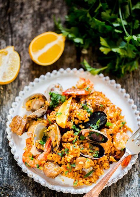 Chicken And Seafood Paella A Classic Spanish Rice Dish Made With Arborio Rice Packed With