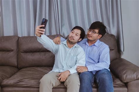 Premium Photo Happy Gay Couple Taking A Selfie With Mobile Phone