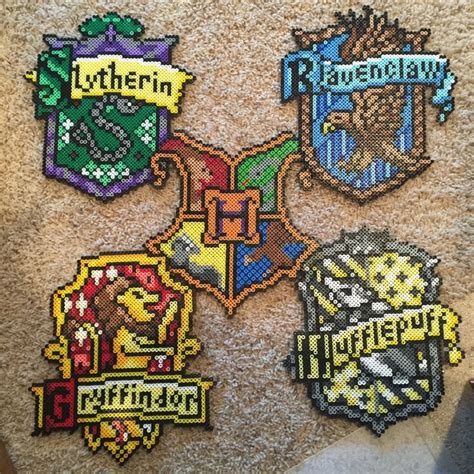 Hogwarts Crests Hogwarts Slytherin Gryffindor Hufflepuff Harry Potter