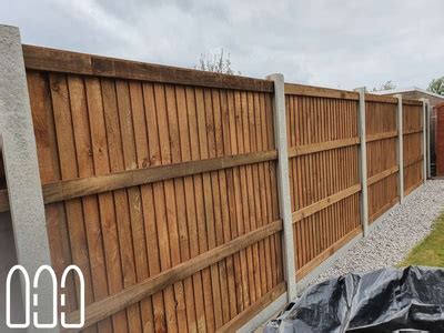 Close Board Fencing With Concrete Posts And Gravel Boards