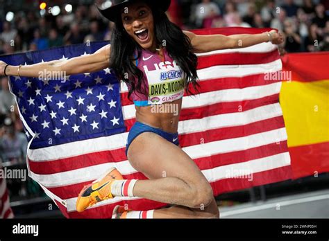 Tara Davis Woodhall Of The United States Poses After Winning The Gold