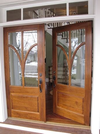 double front doors wood - Hooked on Houses