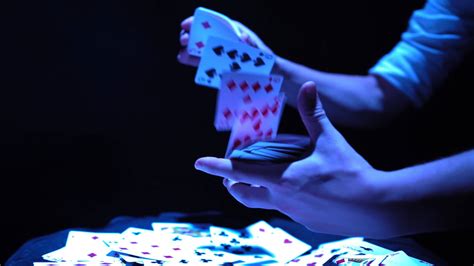 Close-up, Hands of a Magician Performing Tricks with a Deck of Cards ...