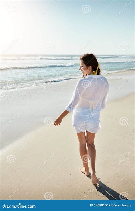 The Beach Is Where My Heart Is At A Beautiful Young Woman Enjoying Her