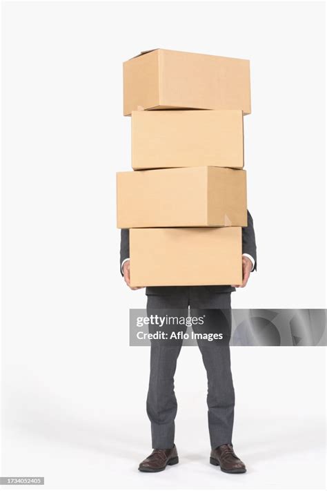 Young Japanese Businessman Carrying Boxes High Res Stock Photo Getty