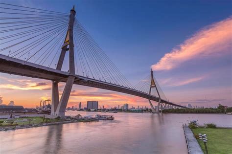Premium Photo Suspension Bridge Over River In City
