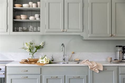 Transform Your Kitchen With White Cabinets And A Stunning Sage Green