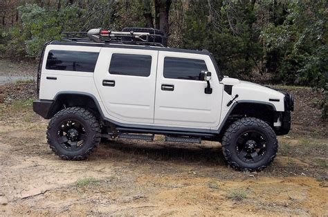 Hummers Online: Nice White Hummer H2 with 4'" Rancho Lift and 38" Nitto Mud Grapplers