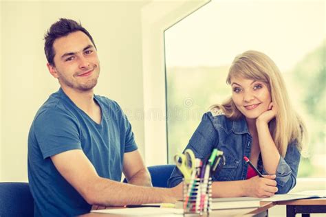 Two Students Talking in Classroom Stock Image - Image of talking, college: 83278031