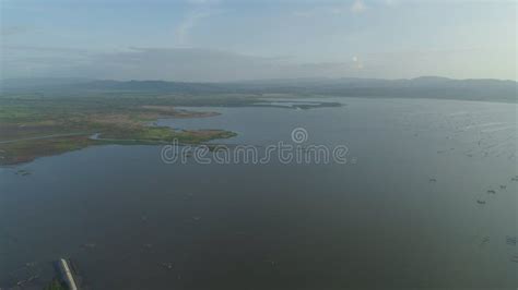 Landscape with a Lake, Farm Lands and Mountains. Stock Photo - Image of ...