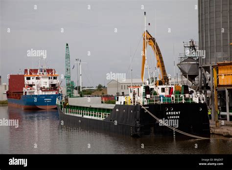 Container Ships Unloading At Wharf Goole Port Yorkshire UK Stock Photo