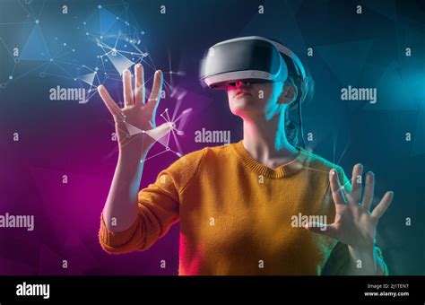 Metaverse technology concept. Woman with VR virtual reality goggles ...