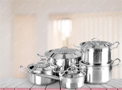 Premium Photo | Stainless steel pots and pans