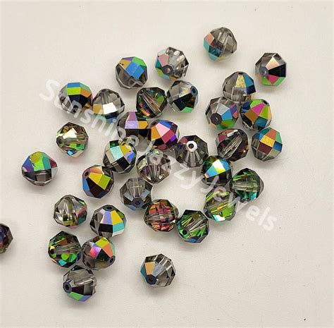 Pc Swarovski Crystal Vitrail Medium Geometric Cut Round Beads