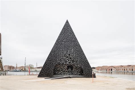 David Adjaye Shapes Kwaeε Pavilion As Triangular Timber Prism At Venice