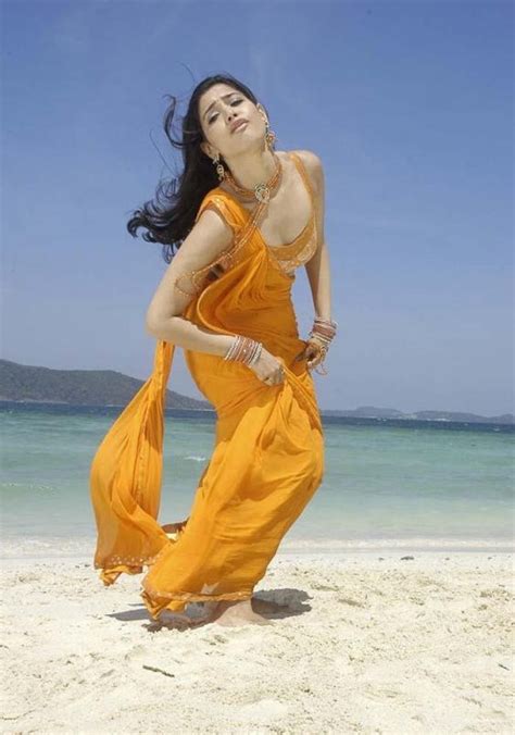 Tamanna Bhatia Wearing Yellow Saree Photo Still | ActressHDWallpapers