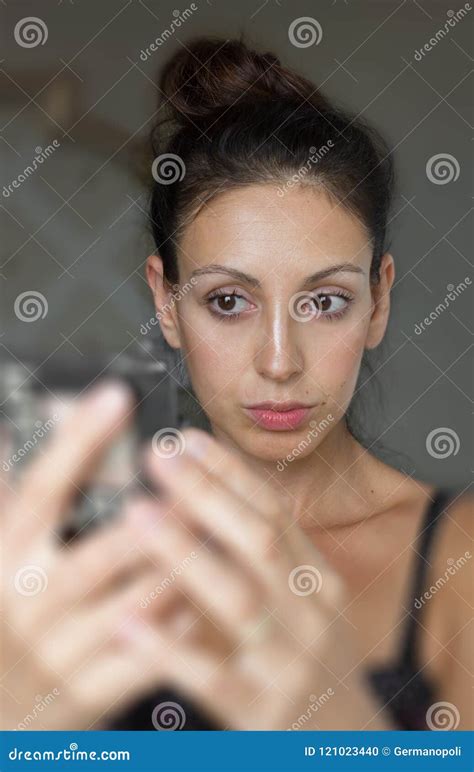 Woman Looking At Herself In The Mirror Stock Photo Image Of Female