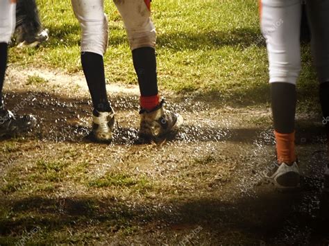 Football Players On Muddy Field Stock Photo Tdoes