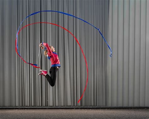 premium photo young women funny jumping high