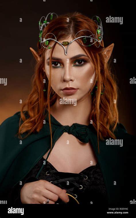 Portrait Of Beautiful Charming Girl With Silver Tiara On Her Head