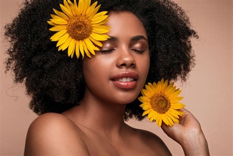 Premium Photo Black Woman With Sunflowers In Hair