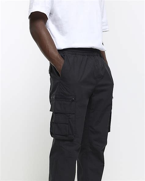 Black regular fit cargo trousers | River Island